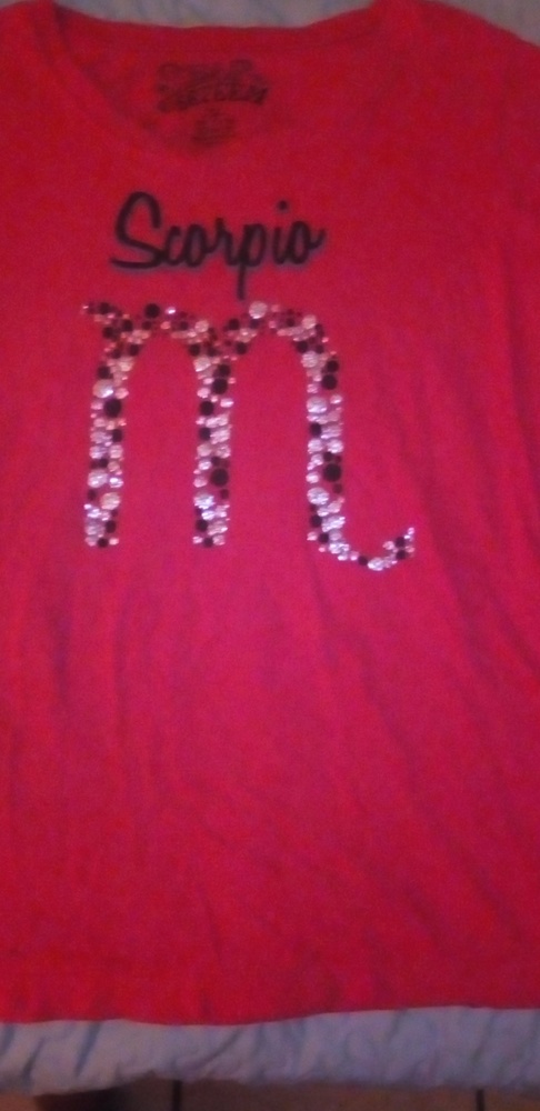 Red scorpio t shirt.